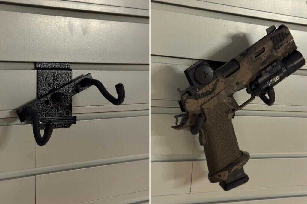 Adjustable Hold Up Displays pistol mount hooks and center bracket on the modular gun wall