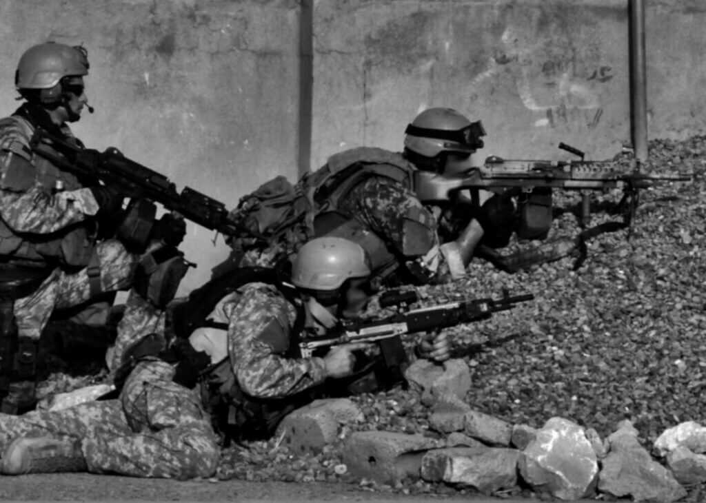 US service members in Iraq illustrating the deadly conflict surrounding Fabrizio Quattrocchi's captivity