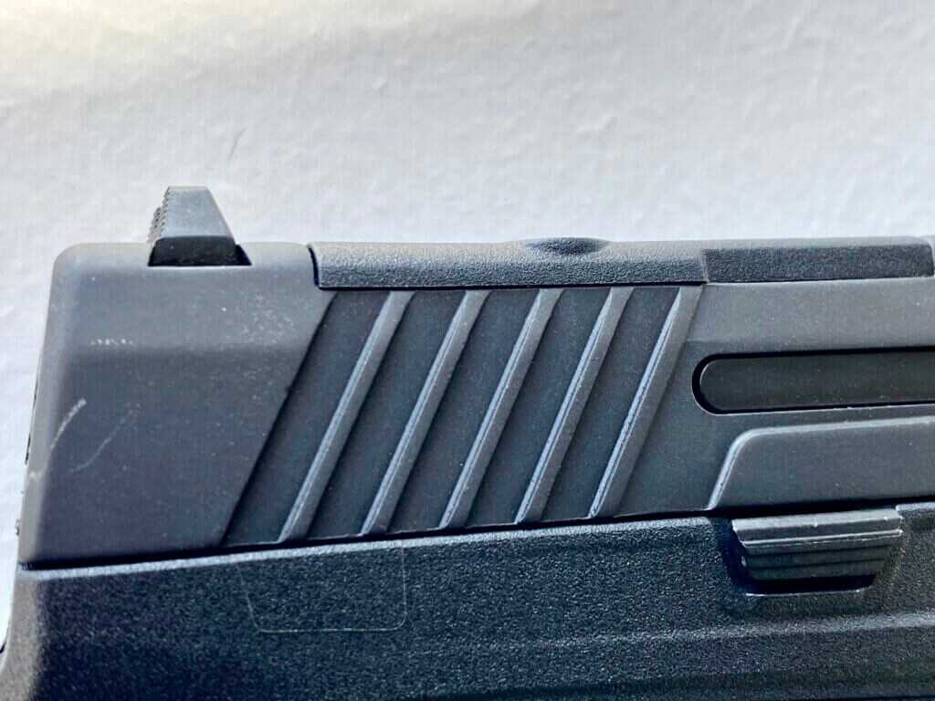 Taurus TX9 Sub-Compact rear slide serrations for easy slide manipulation
