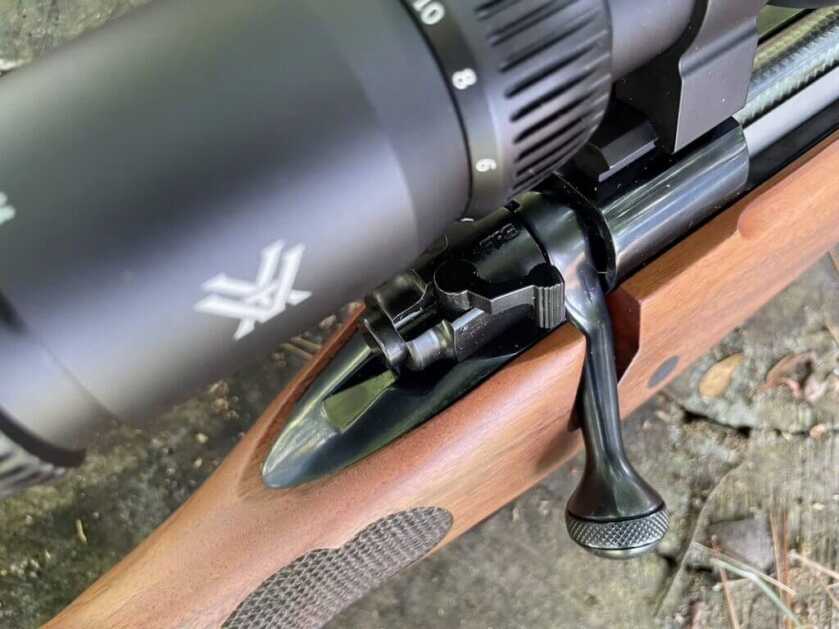 Three-position wing safety lever on a Winchester Model 70 Featherweight hunting rifle