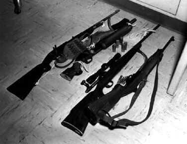 Charles Whitman arsenal used during the UT Tower sniper attack including rifles pistols shotgun and ammunition