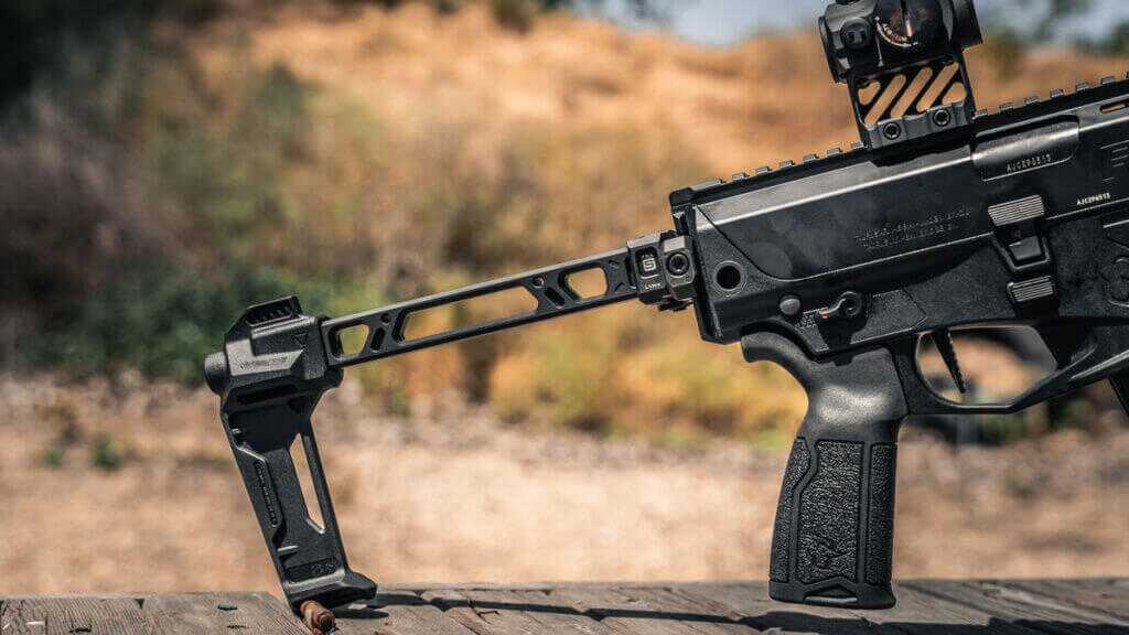 Taurus RPC with Strike Industries FSA folding brace folded for compact carry