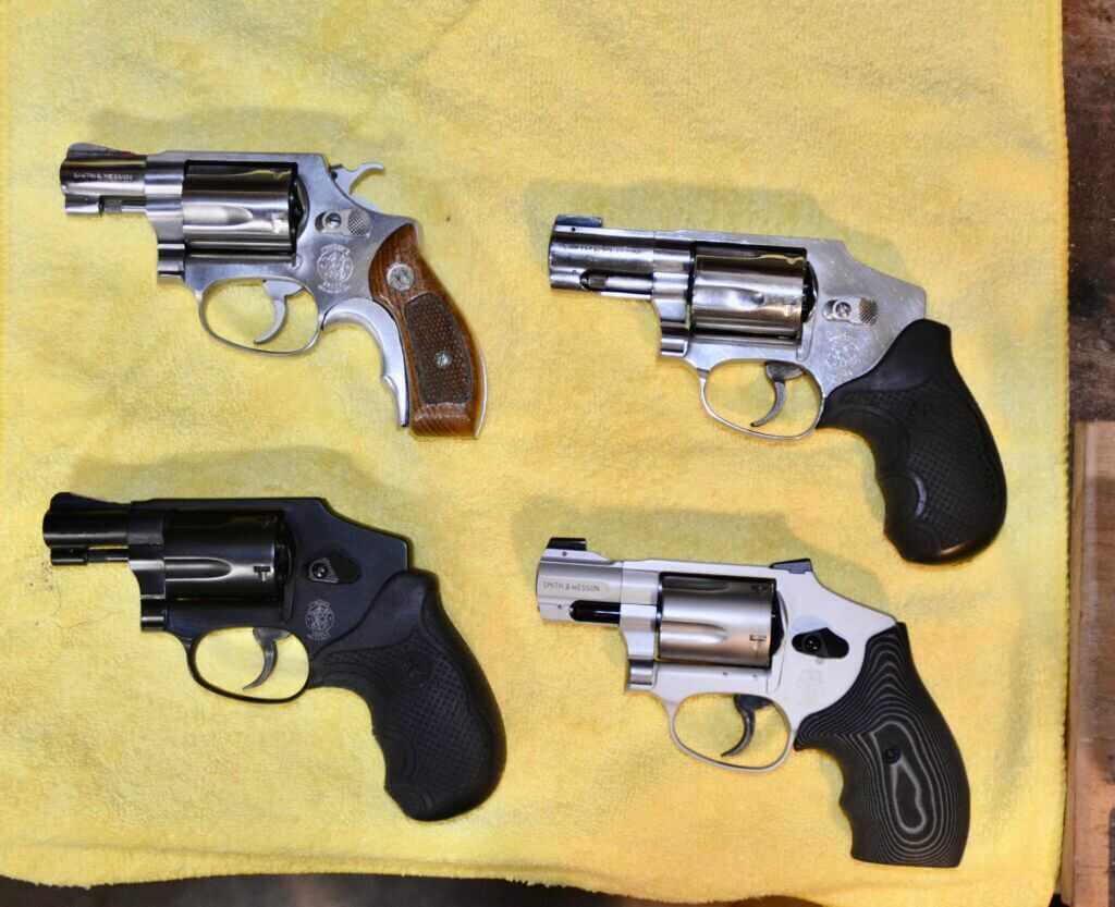 Smith and Wesson J-Frame revolvers staged for concealed carry evaluation