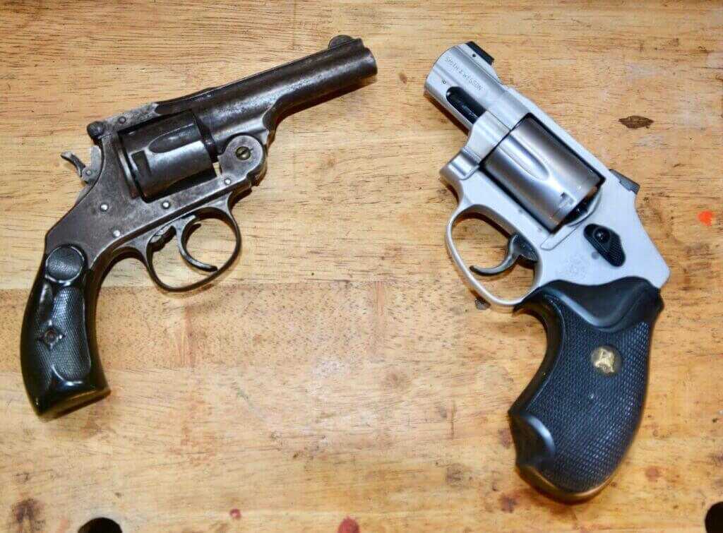 Old Hopkins and Allen .32 Break Top revolver beside modern Smith and Wesson J-Frame CCW revolver