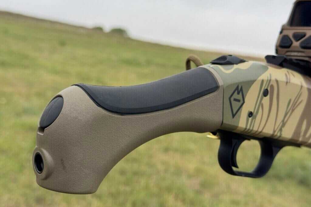 AfterShock pistol grip on the Mossberg 590 Bliksem with QD sling swivel insert and rubber palm pad