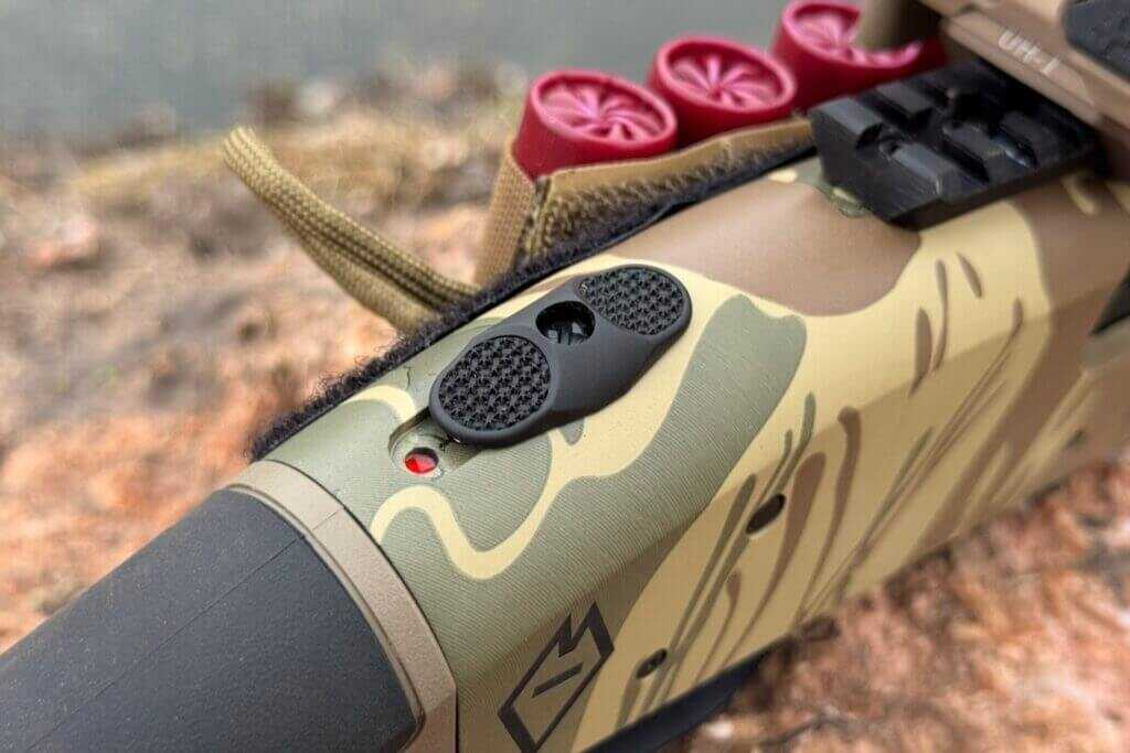 Oversized textured safety selector on the Mossberg 590 Bliksem compact 12-gauge firearm