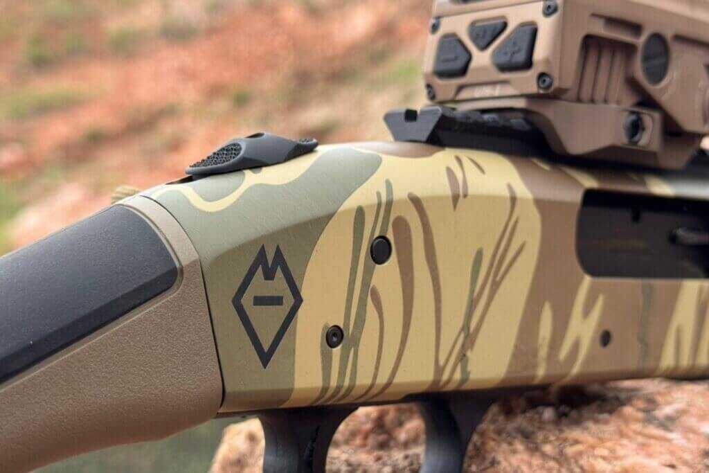 Ministry of Defence Wolf logo engraving on the Mossberg 590 Bliksem receiver