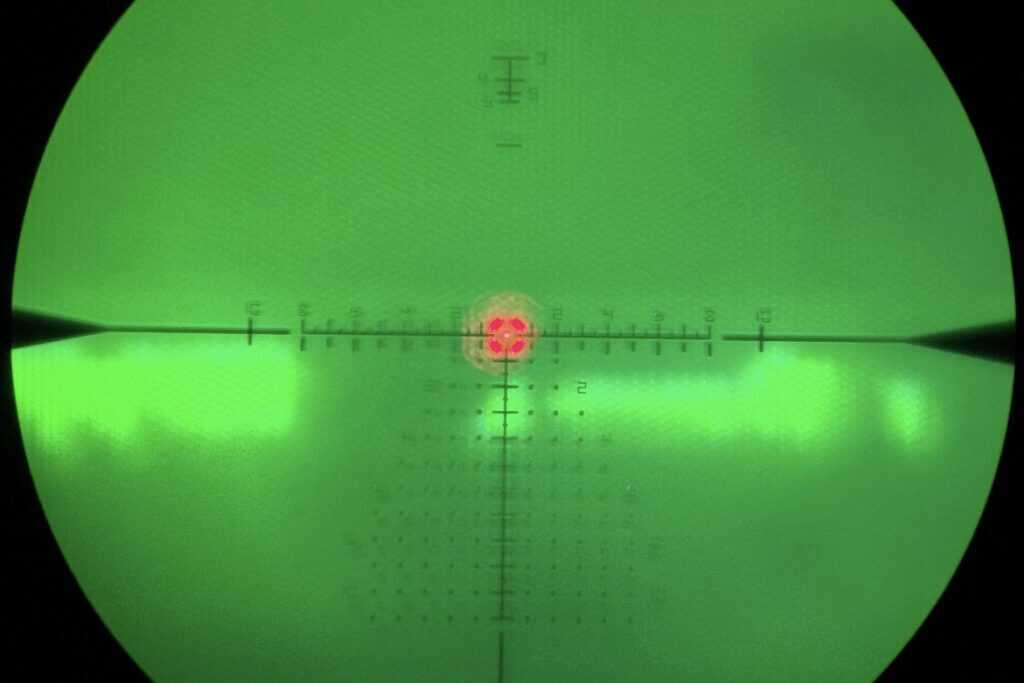 Phone photo through LPVO with DNT Hydra HS335R clip-on thermal at 10x viewing cattle at 290 yards