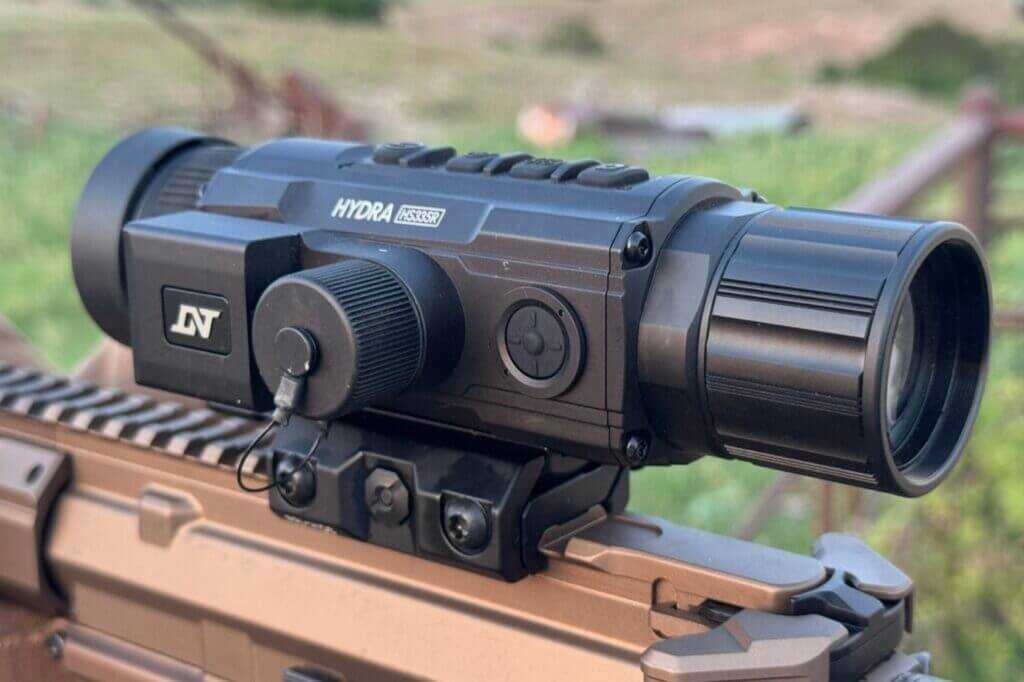 DNT Hydra HS335R laser rangefinder button on left side of housing