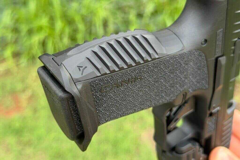 Radian backstrap on the CANiK PRIME RADIAN showing enhanced grip shape for recoil control