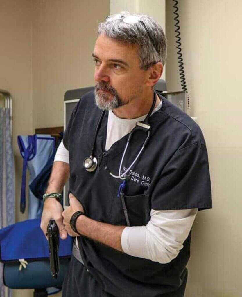Docter holding Gun