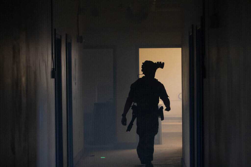 FBI Hostage Rescue Team operators training in tactical silhouette environment
