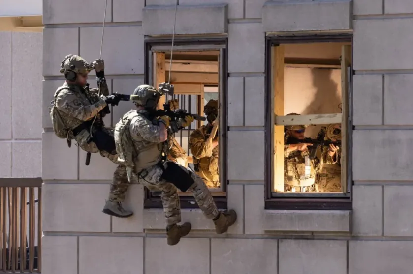 FBI Hostage Rescue Team operators training during a high-risk tactical window rescue exercise