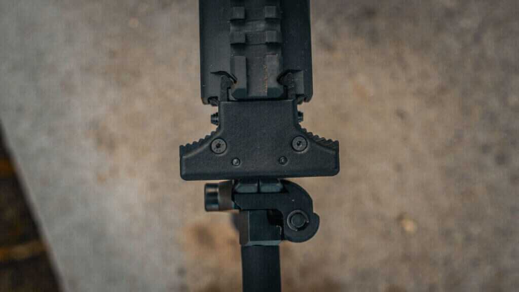 KelTec KP50 non-reciprocating rear charging handle shown from both sides