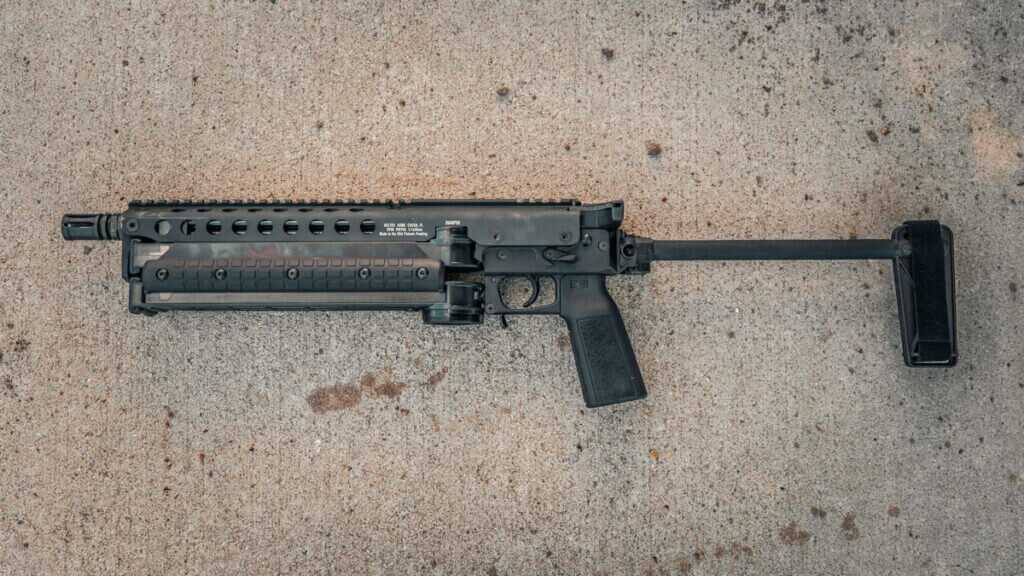 KelTec KP50 with folding brace folded for compact storage with 100-round Jungle Clip capacity