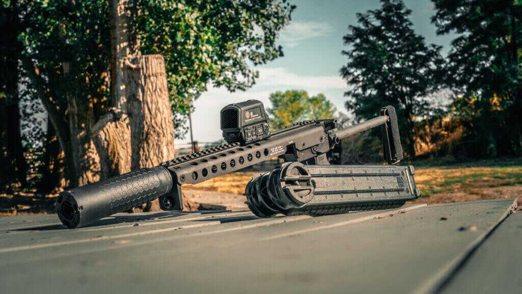 Suppressed KelTec KP50 5.7x28mm pistol fitted with SIG flow-through suppressor