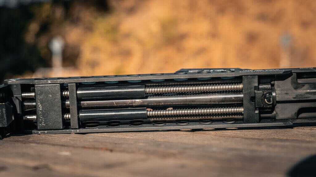 Field-stripped KelTec KP50 showing bolt and dual recoil-spring assembly