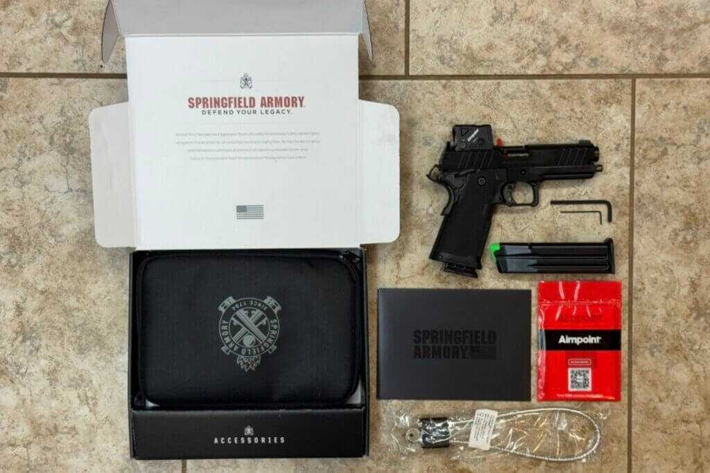 Springfield Prodigy COA pistol and magazines inside the factory soft-sided case