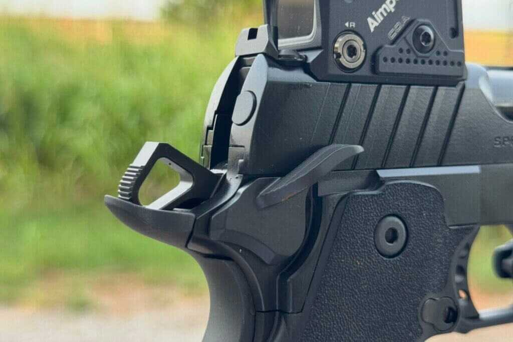 Ambidextrous thumb safety on the Springfield Prodigy COA pressing against the shooter's hand