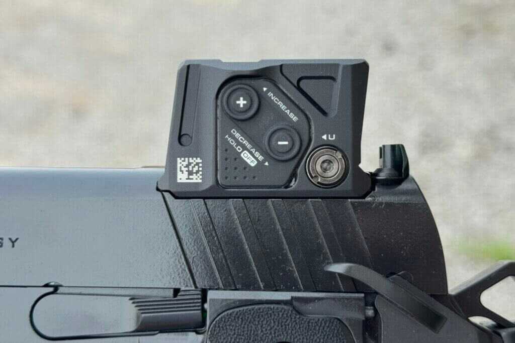 Front hook and rear sight wedge securing the Aimpoint COA to the Prodigy A-CUT slide