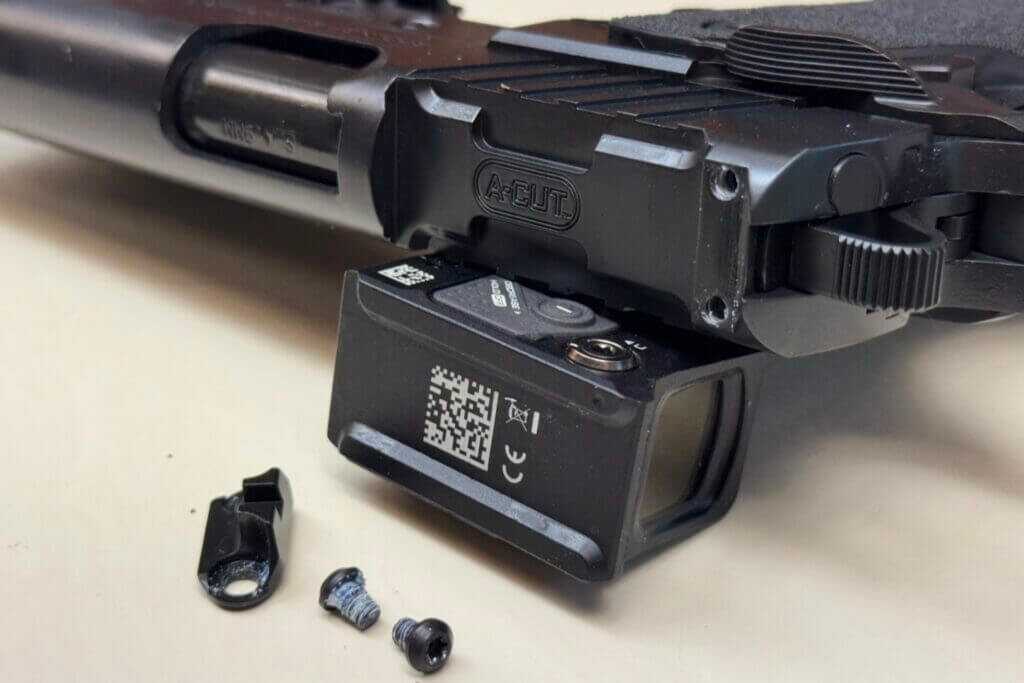 Close view of the Springfield Prodigy A-CUT mounting interface beneath the Aimpoint COA
