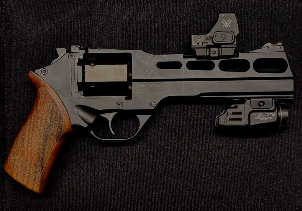 Chiappa Rhino 60 DS 10mm revolver configured with accessory rail and Picatinny optic mount on a black background