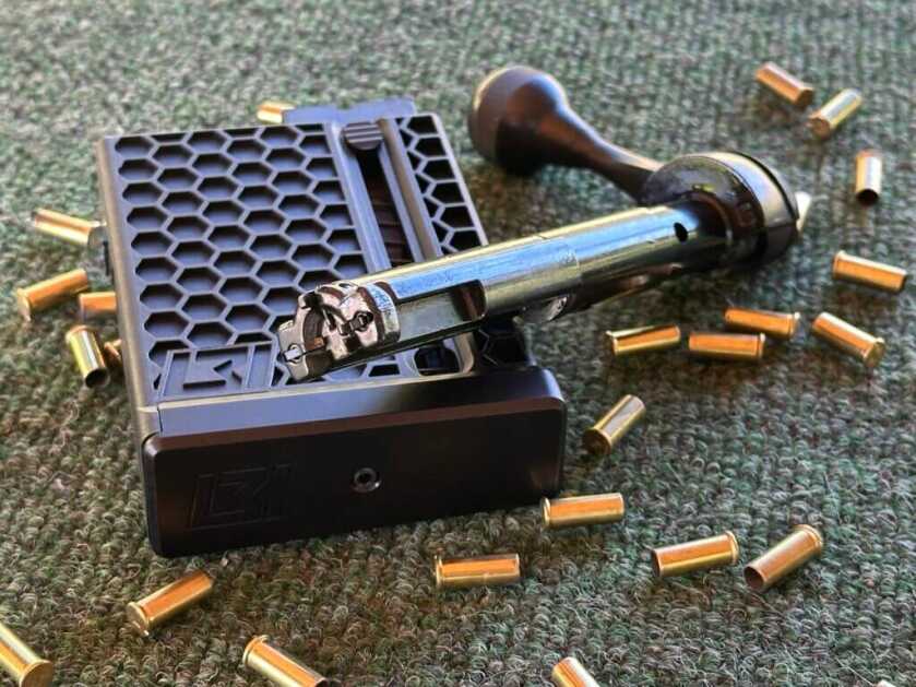 Savage 110 RF Elite Precision closeup showing the L3i magazine and front-locking rimfire bolt design