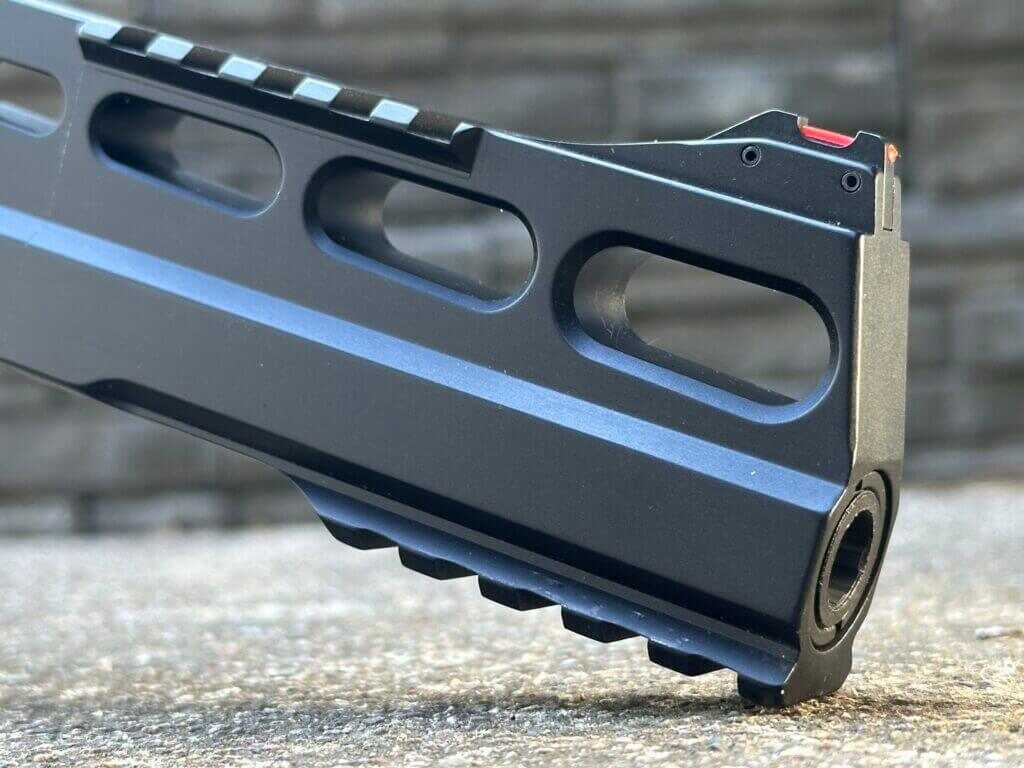 Closeup of the Chiappa Rhino 60 DS 10mm six-inch barrel showing its low bore axis and bottom-chamber layout