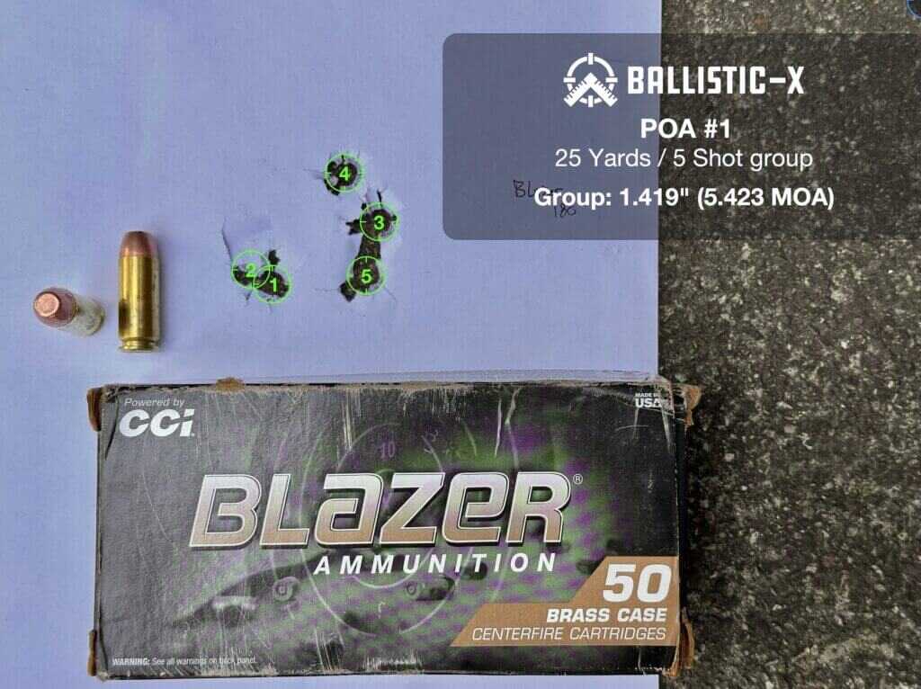 Blazer 180 grain FMJ 25-yard accuracy target from the Chiappa Rhino 60 DS 10mm showing a 1.42 inch group