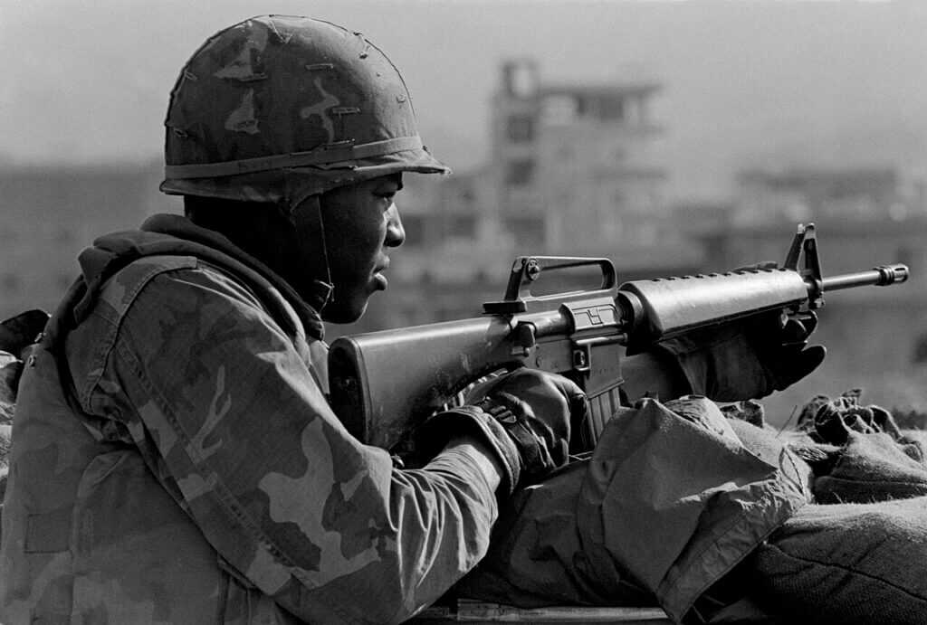 US Marine standing guard at Beirut Airport in 1983 with an M16 rifle chambered for .223-era 5.56 ammunition