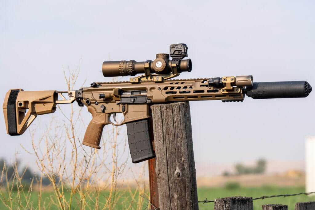 Steiner MPS 2.0 mounted above a Nightforce ATACR 1-8x on a SIG MCX