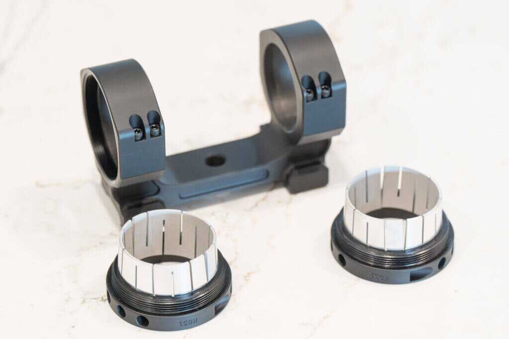 Project 47 Force 360 collet scope mount applying pressure around a riflescope tube