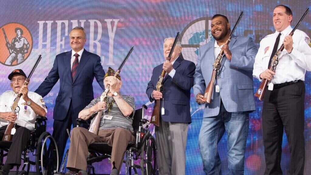 Anthony Imperato honoring an American veteran at a Henry Repeating Arms event