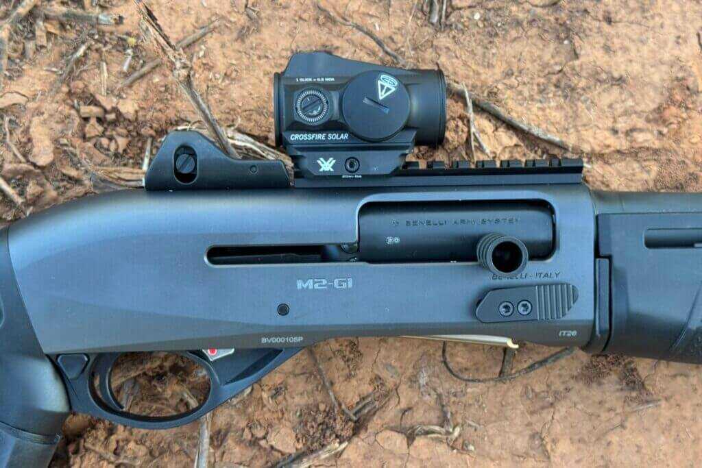 Benelli M2-G1 oversized bolt release and charging handle for tactical shotgun use