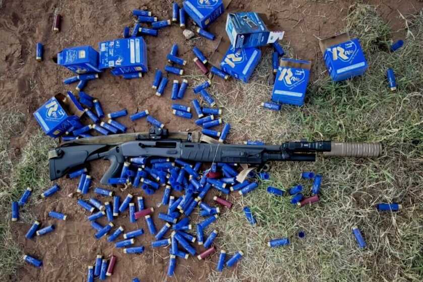Rapid-fire Benelli M2-G1 reliability testing with multiple boxes of 12-gauge ammunition
