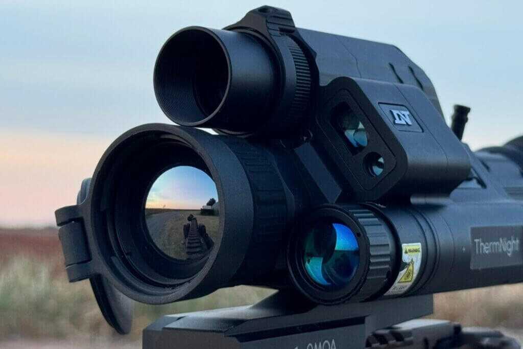 Front of DNT TNC635R showing thermal lens digital camera IR illuminator and laser rangefinder