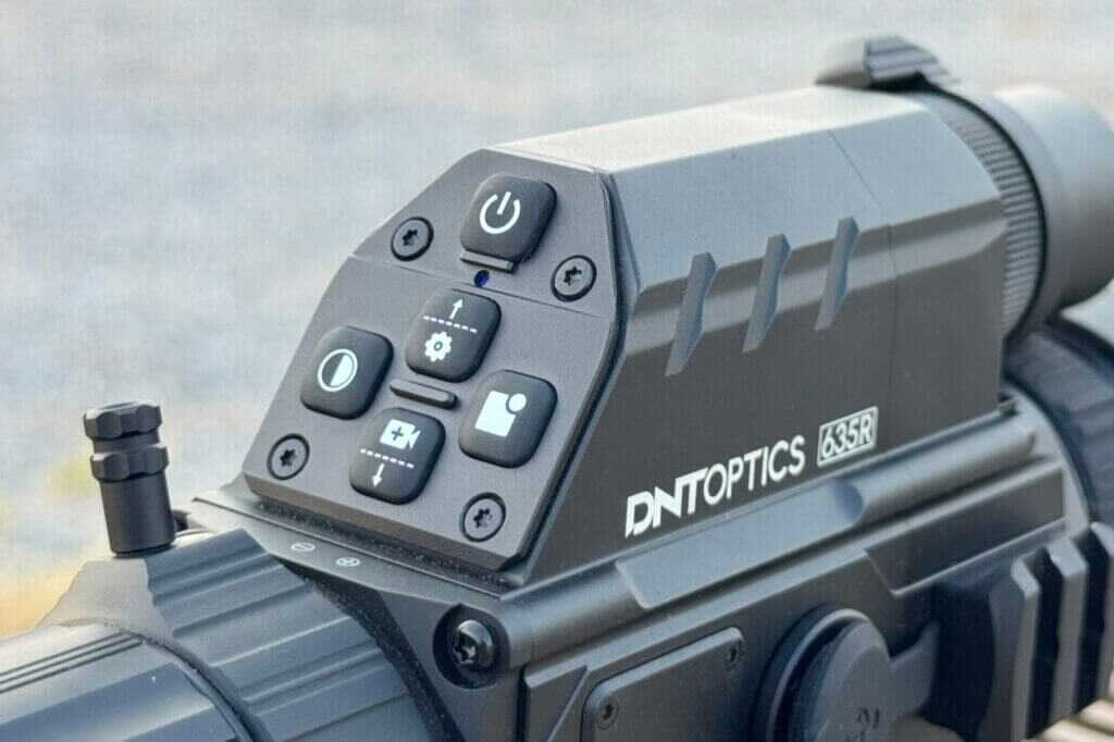 Five compact control buttons across the top of the DNT TNC635R housing