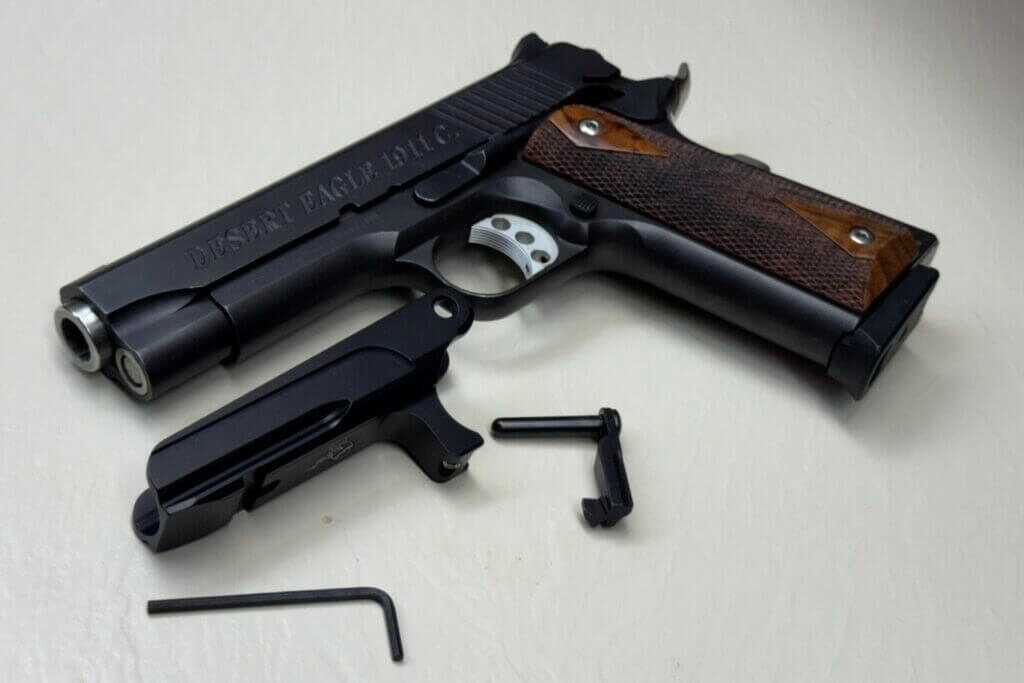 MisterSeven 1911 rail attached using the included elongated slide release