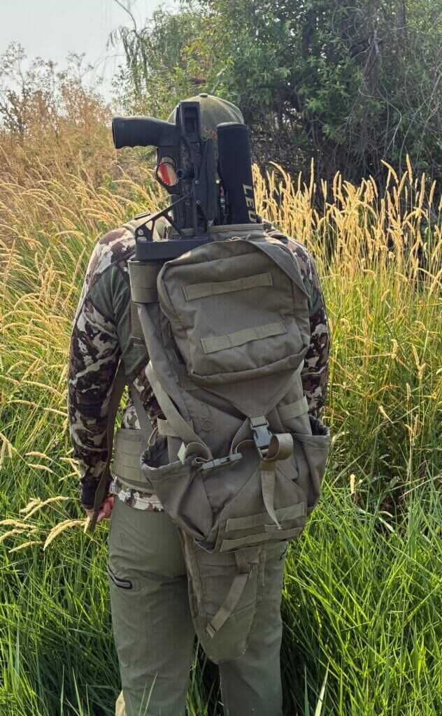 Seekins Element Hunter M3 with 7-inch suppressor carried in Eberlestock Gunrunner pack