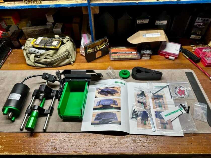 RCBS MatchMaster Precision Case Trimmer parts laid out beside the assembly instructions