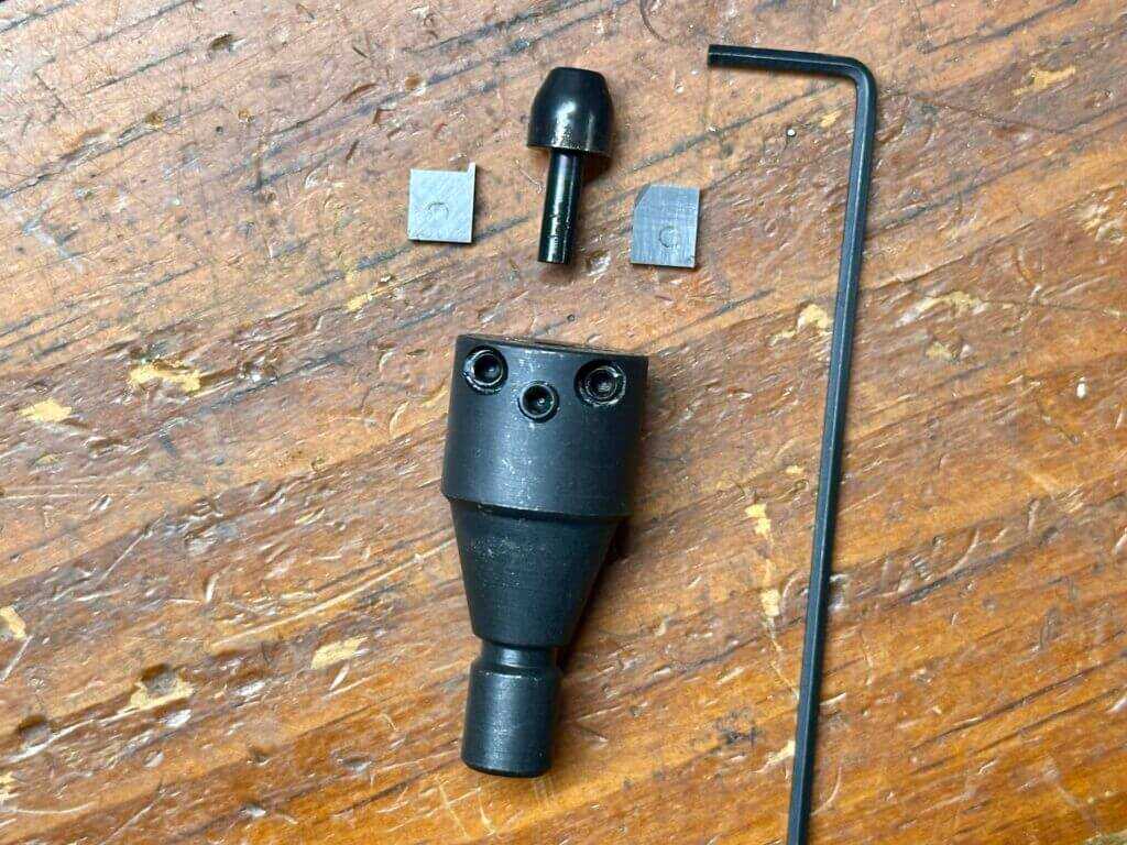 RCBS MatchMaster 3-way cutter head disassembled to show adjustable blades and interchangeable pilot