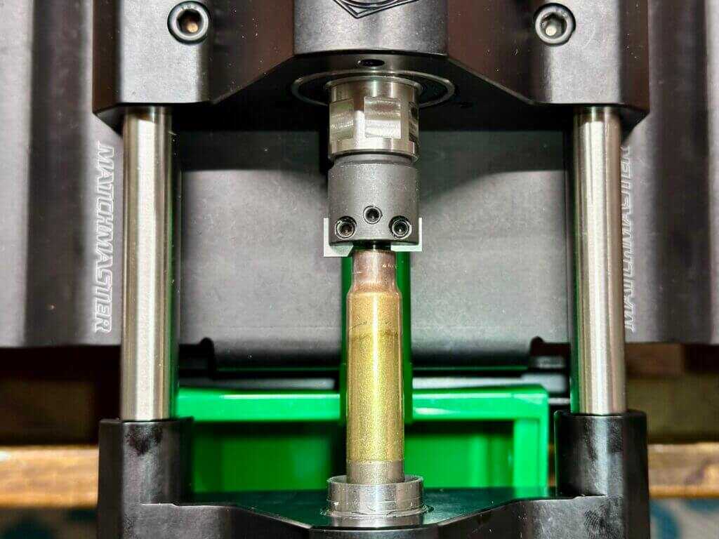 RCBS MatchMaster Precision Case Trimmer processing brass with the cutter shield removed