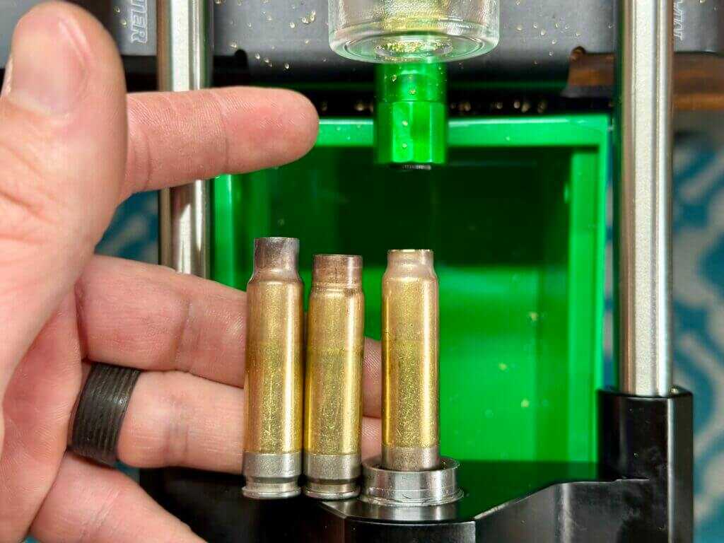 Brass cases showing intermediate .338 caliber trimming before final sizing to .375 caliber for 375 Raptor