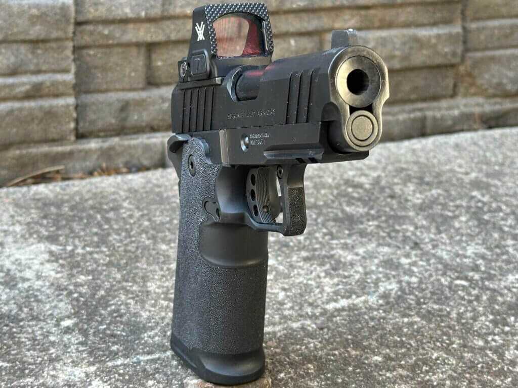 Muzzle closeup of Springfield Prodigy 3.5 AOS showing flush fitting guide rod and reverse plug
