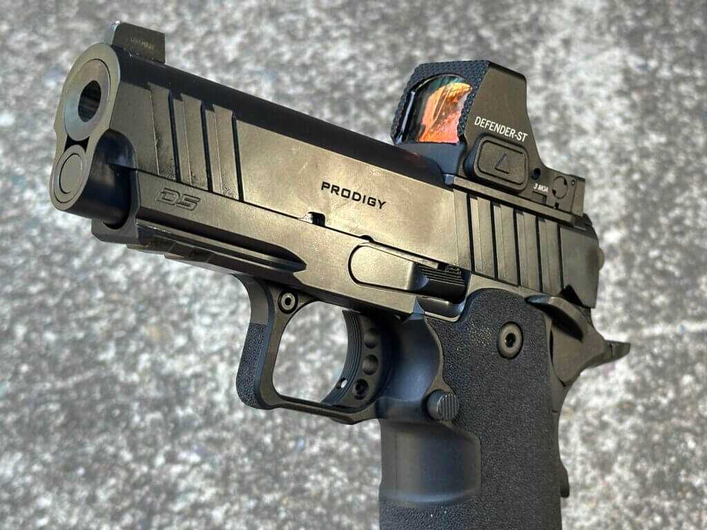 Closeup of Springfield 1911 DS Prodigy 3.5 AOS Picatinny rail fitted with weapon light