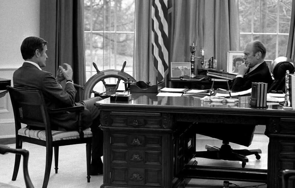 President Gerald Ford meeting CIA Director-designate George Bush during the era of American covert operations