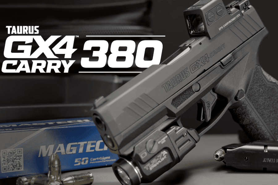 The Taurus GX4 Carry chambered in .380 Auto with a mounted red dot optic, weapon light, and ammunition displayed on a tabletop.