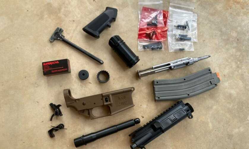 A280-CFE Blaster parts laid out for the 22LR AR-15 based Star Wars build