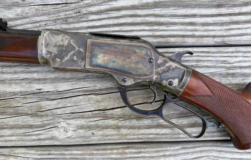 Uberti 1873 Sporting Rifle left-side receiver showing the classic steel-frame Winchester 1873 design
