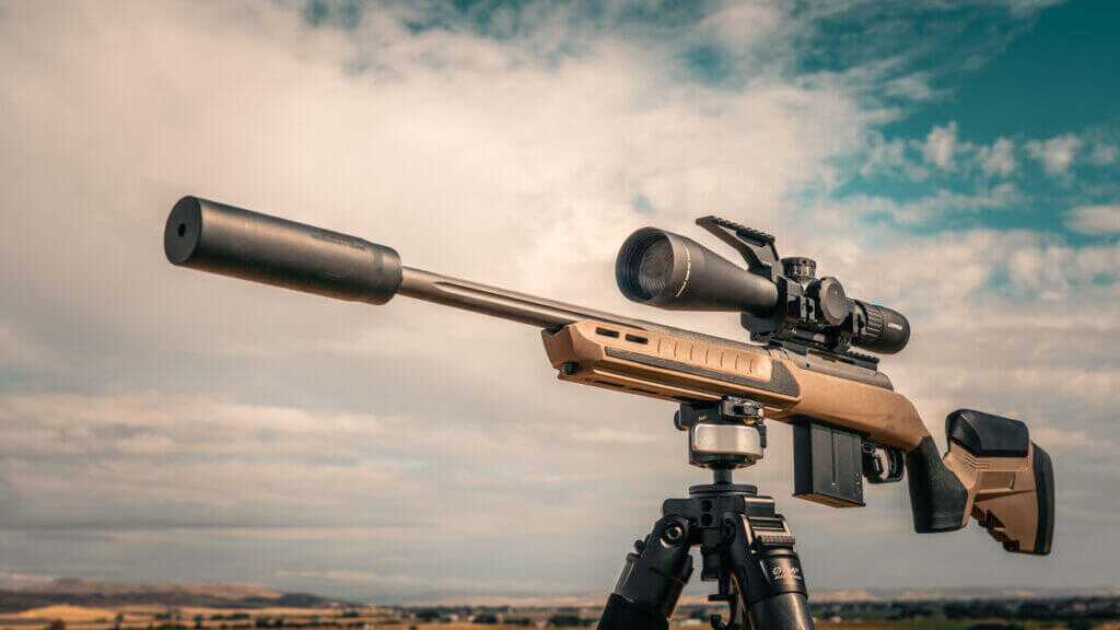 Savage 110 Core Tactical 22 ARC rifle with adjustable stock, ARCA rail, suppressor, Leupold scope and tripod